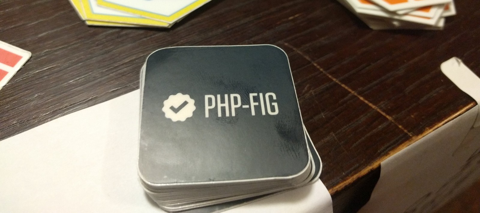 PHP-FIG stickers, shared at the PHPDay front desk